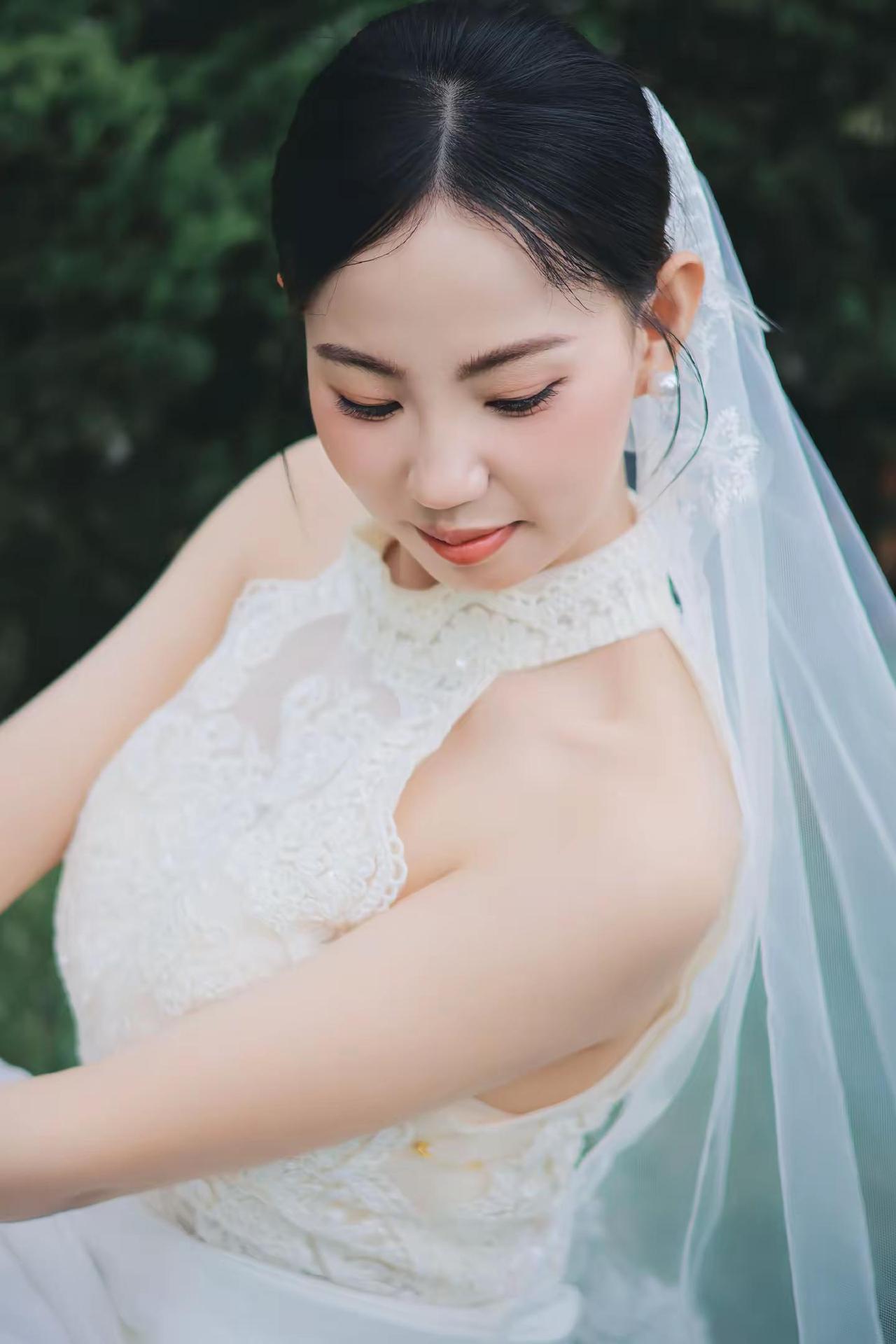 人会在爱里圆满草坪婚纱 礼县
