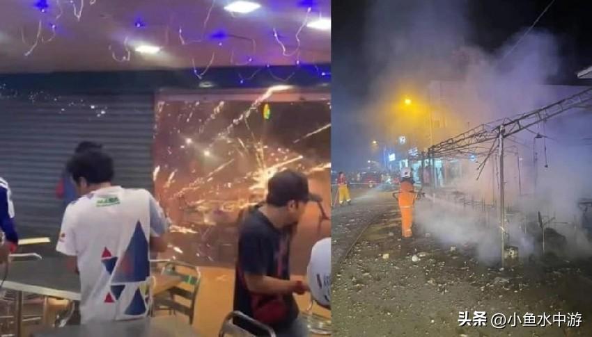 马来西亚一家售卖烟花爆竹的摊位深夜失火，火光冲天。爆竹炸开后四处飞窜，殃及对面的