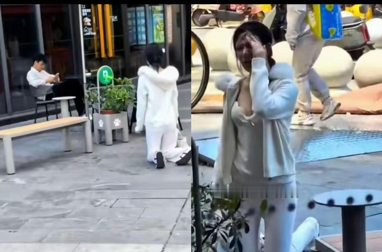 上海，5月16日，一个有些袒胸露乳的年轻姑娘，当街跪在一个男子面前，男子坐椅子上
