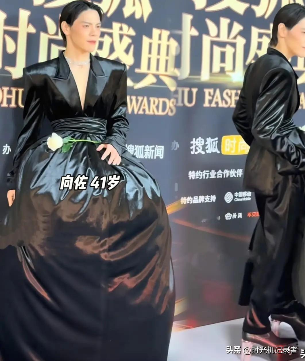 向佐真的无可救药了，向太劝他穿衣正常，还是没听话，这黑色衣服虽然没有女装艳丽，但