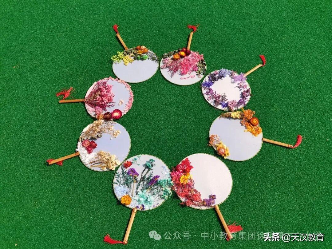 3月5日汉台区徐望镇中心小学举办了“春风如扇 芳华如歌”干花团扇手工制作活动。