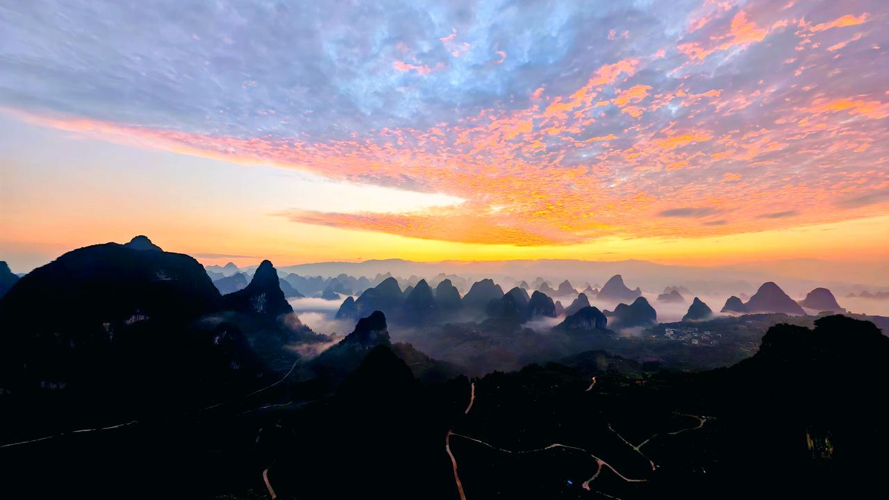 可以分享一张你拍的天空美照吗大美阳朔.馒头寨千里江山晨曦