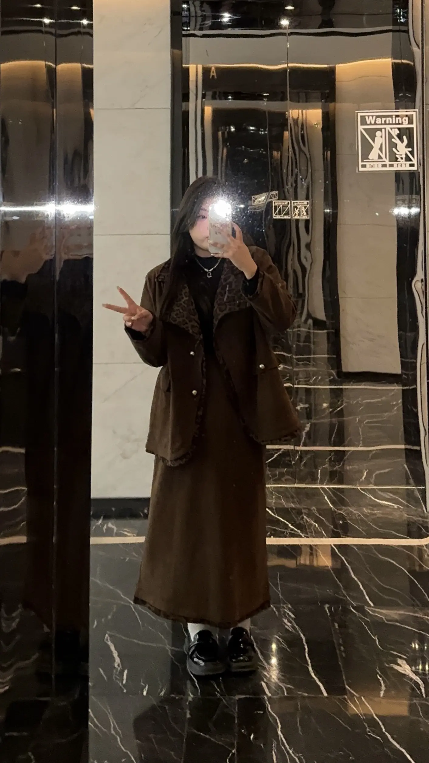 超显瘦的豹纹套装。