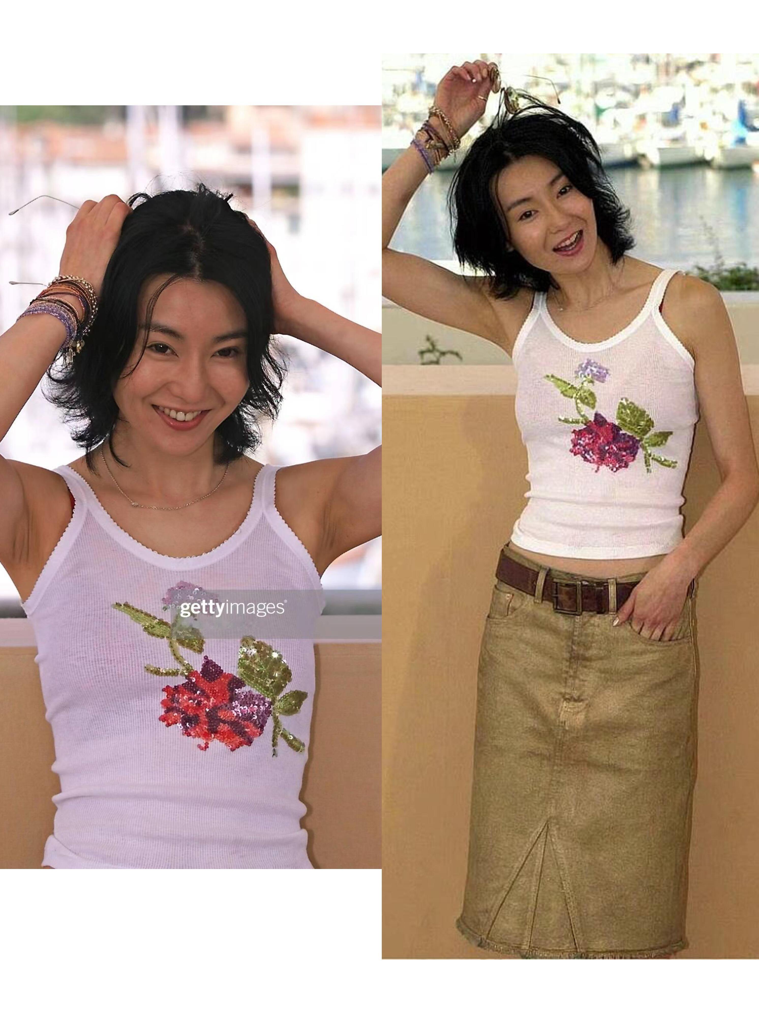 张曼玉一直是松弛感的代名词，千禧年她经常穿着舒适自在的牛仔裤、背心出现在镜头前。