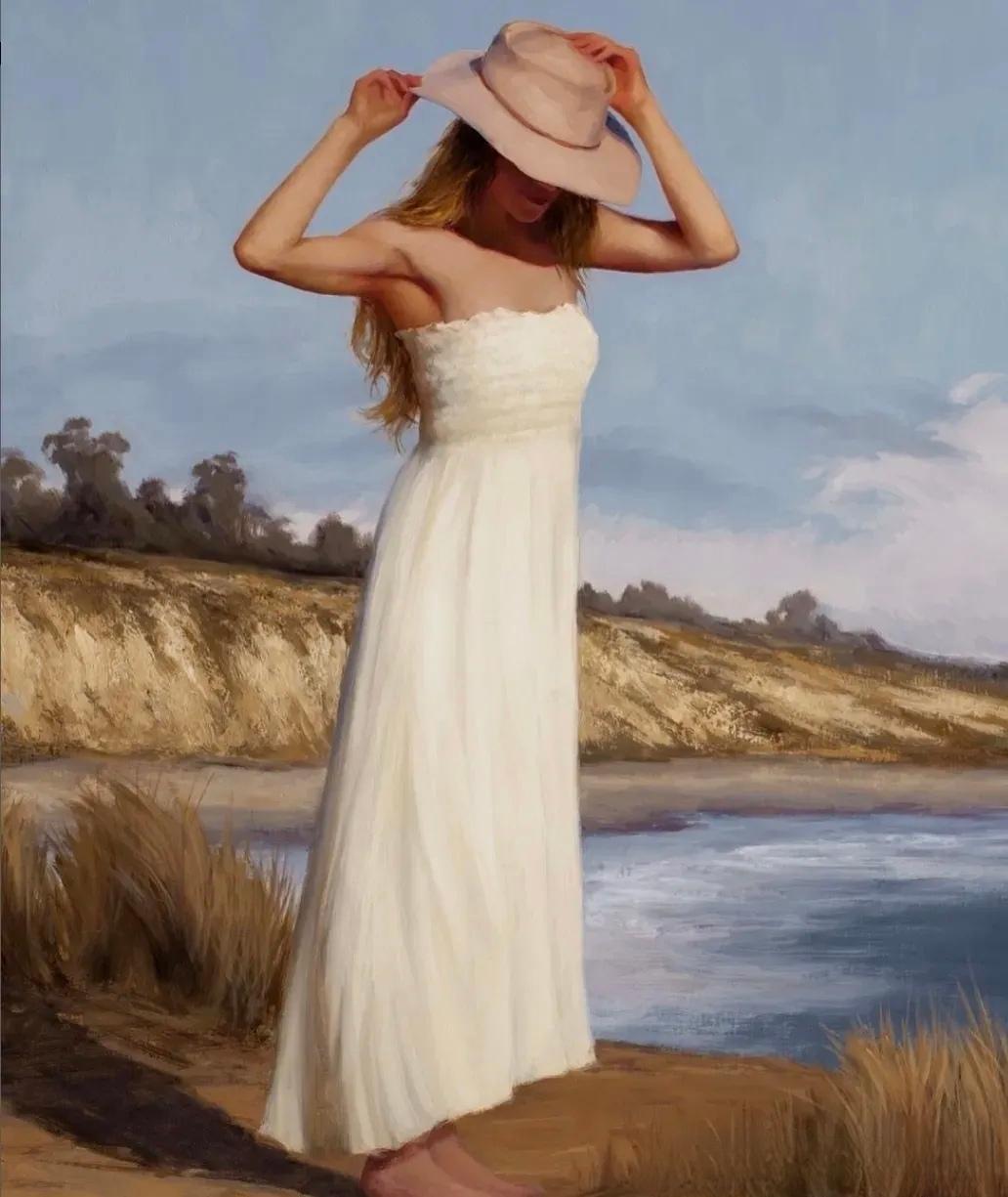 夏日海边漫步，轻纱白裙，微风拂面，悠然自得。
