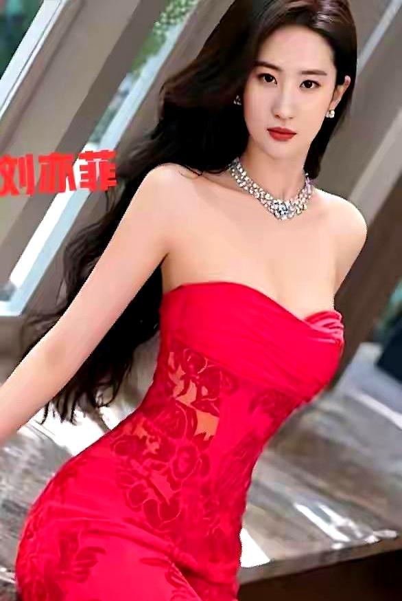 绯色礼裙勾勒曼妙身姿，红唇明眸相映，优雅灵动间自带锋芒。
 

好久不见她这么明