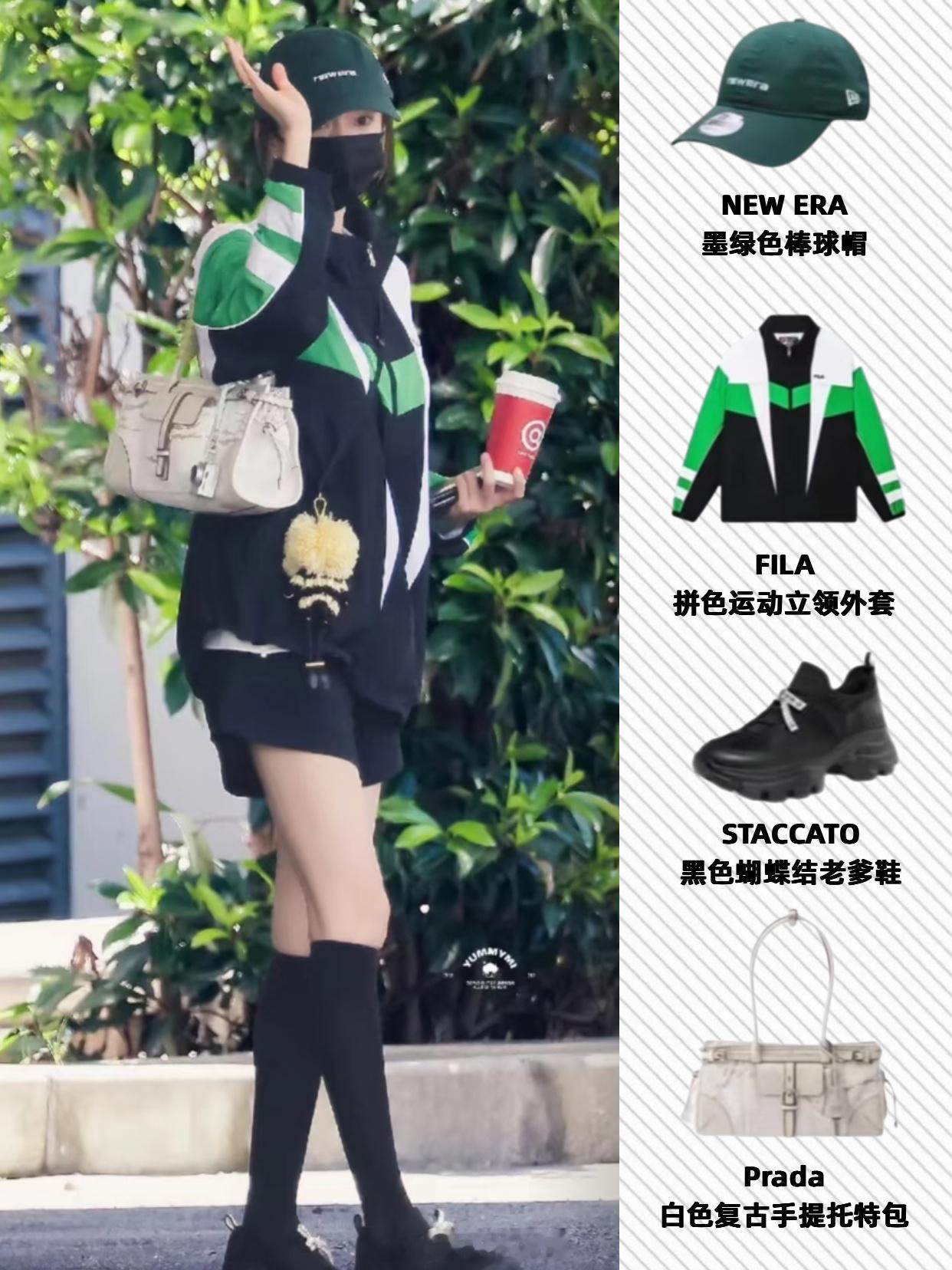 杨幂又一套好看的私服出街，拼色运动外套搭配短裤和老爹鞋，潮流又随性的复古运动风拉