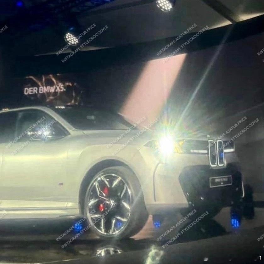 看上去新X5的头灯确实是X造型的四个X造型这回头率有点高了果然经销商爆的料很准啊