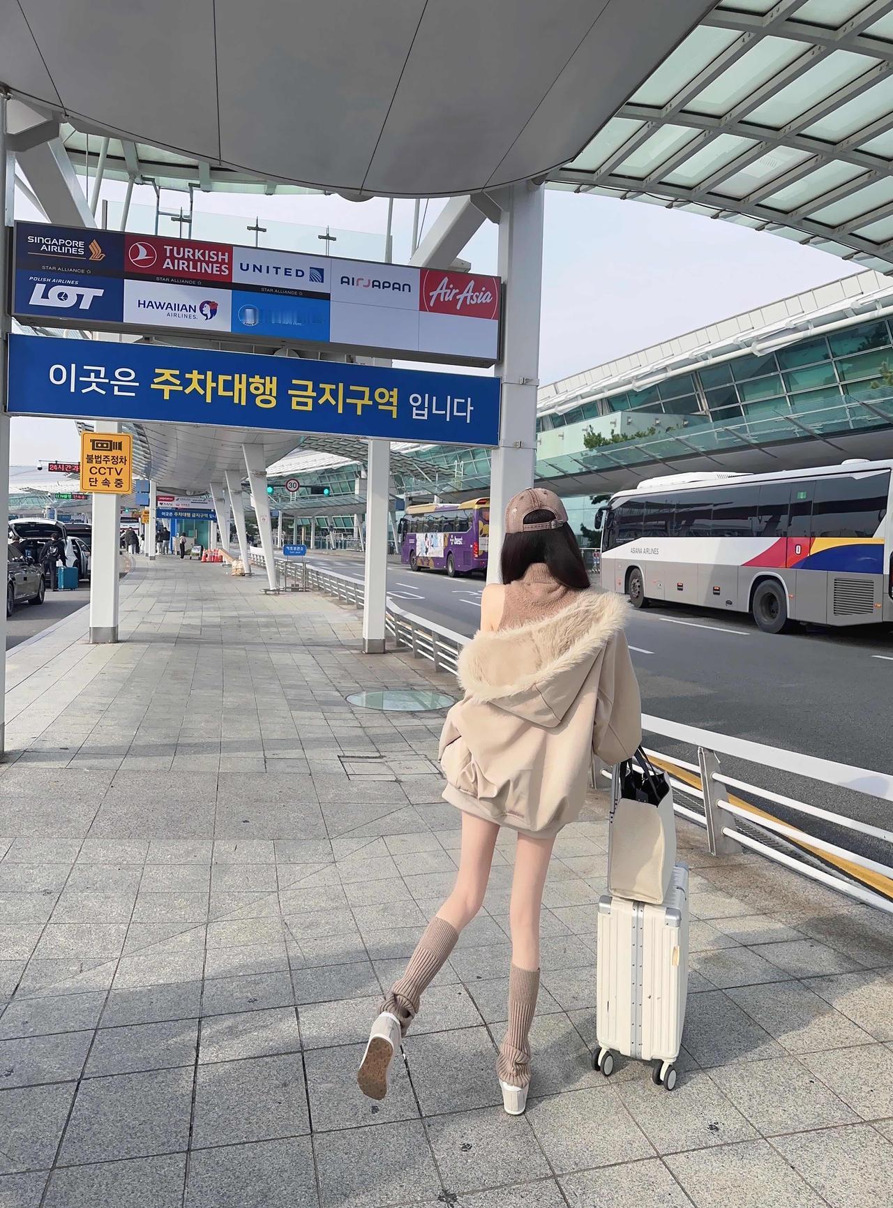 什么样的女人最令人着迷机场也要做个时髦滴美女