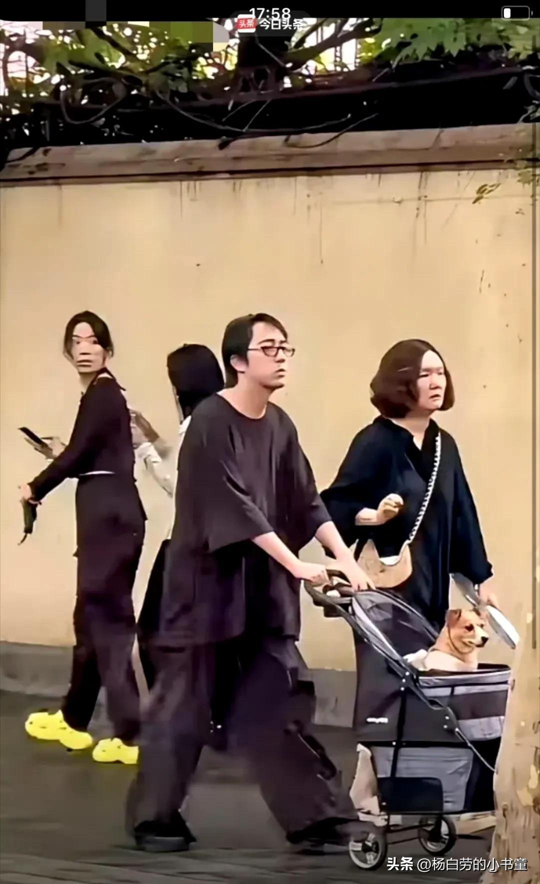 忍不住回头看一眼
只为确认一下摇篮里是人是狗
现在很多人把狗当成儿子来养
供它吃