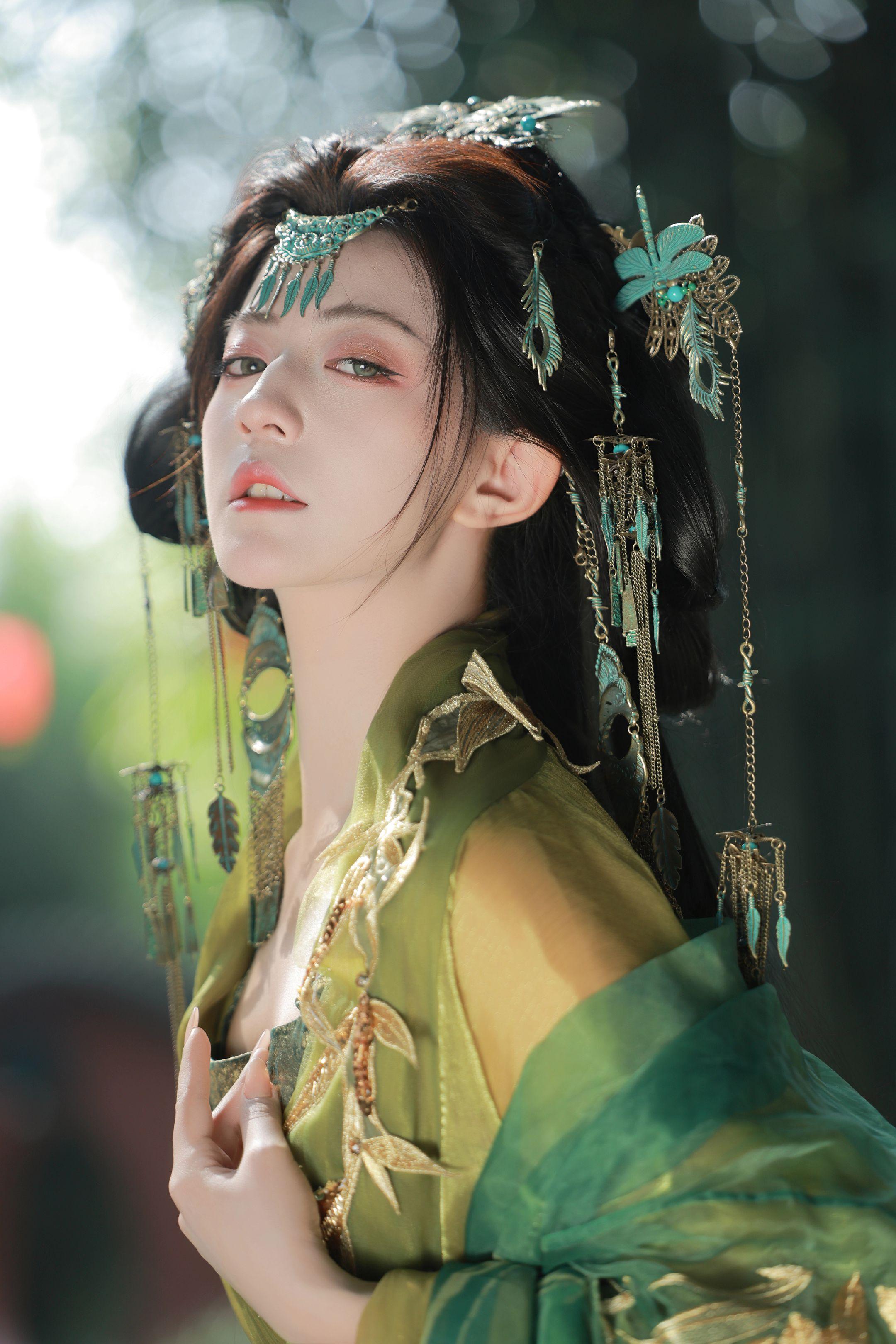 青竹为骨，金缕为衣。
