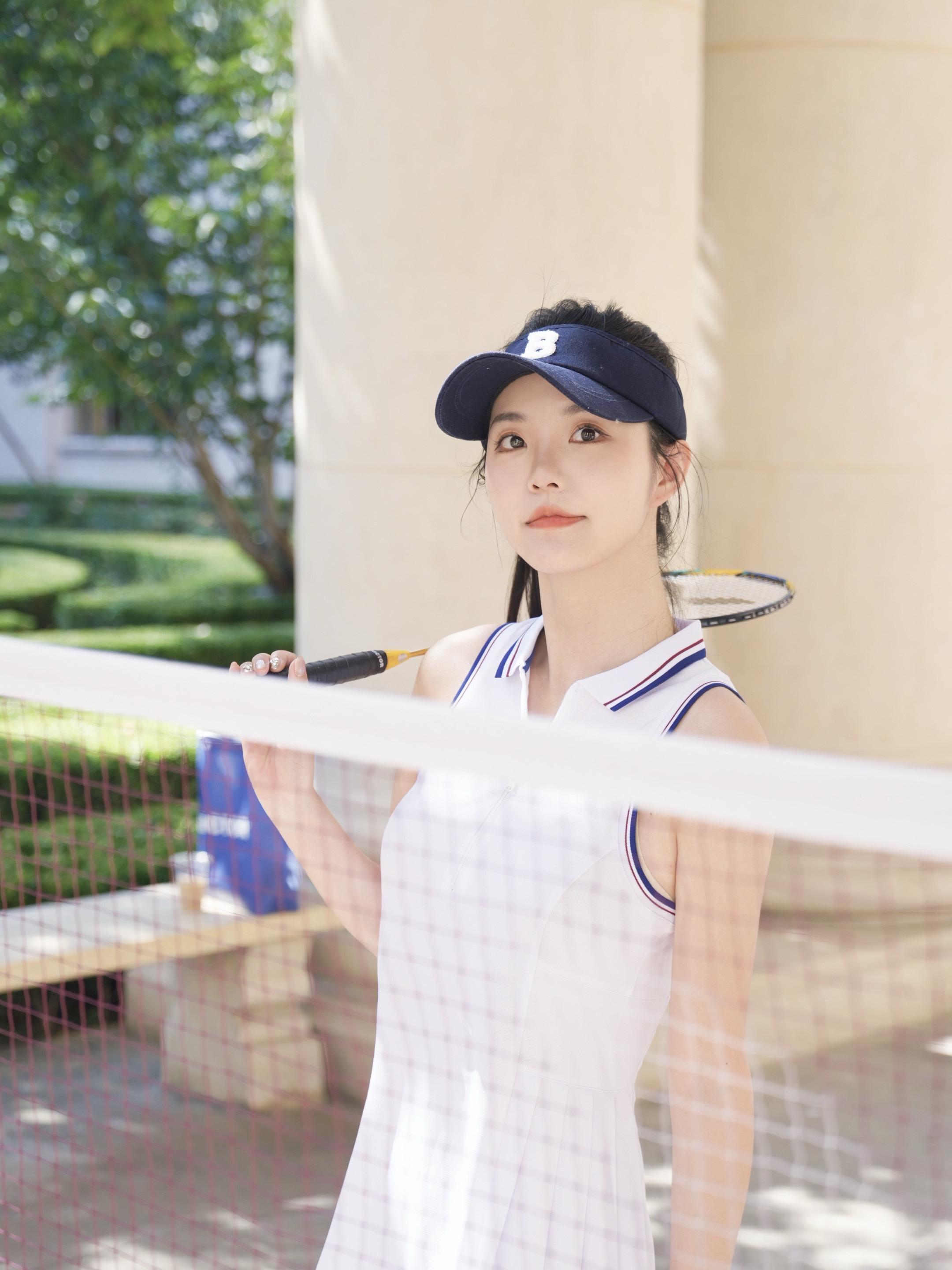 🏸