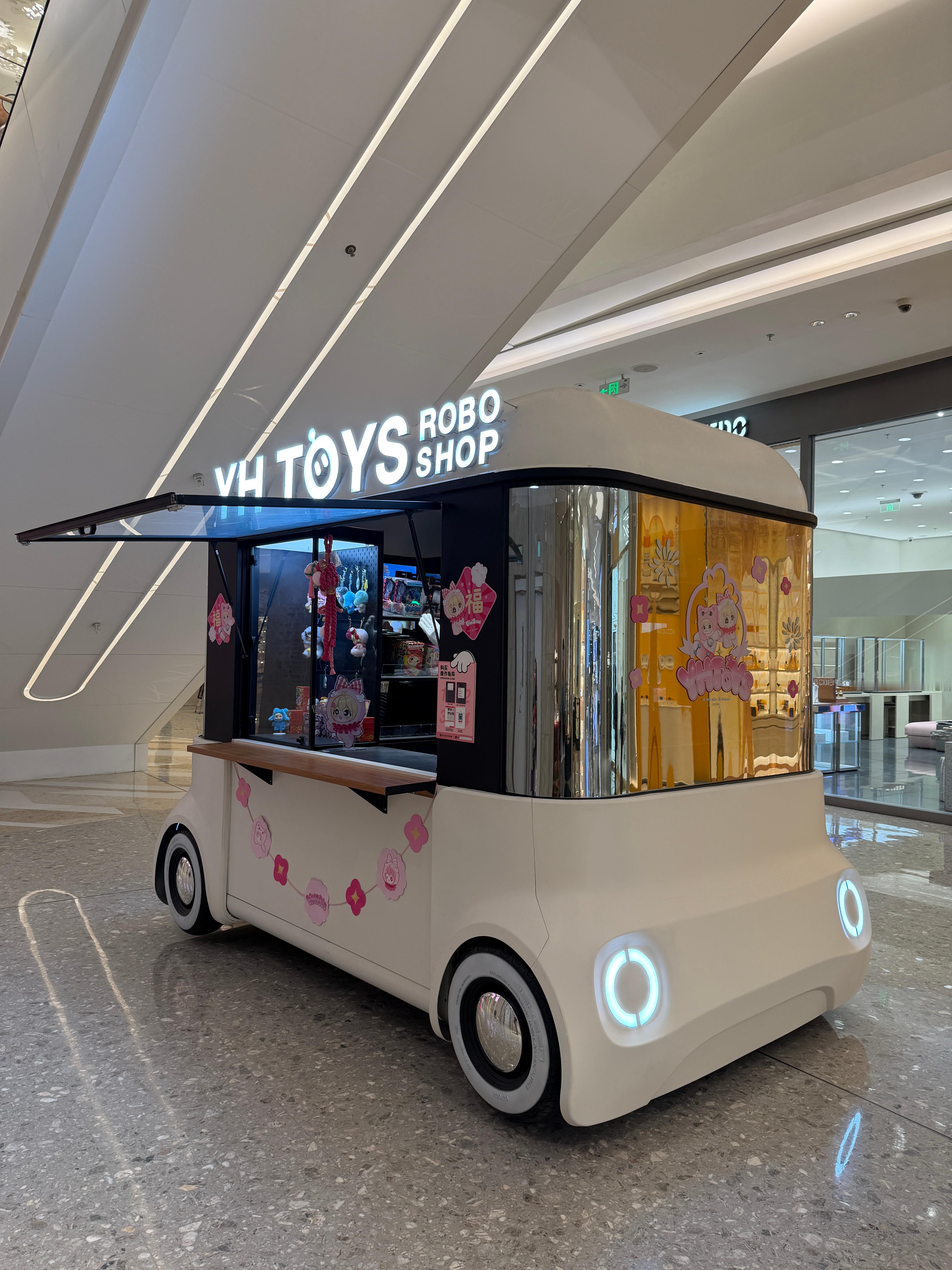 扫码让机器人取货，跟扫码自动掉落取货，有什么区别？ 