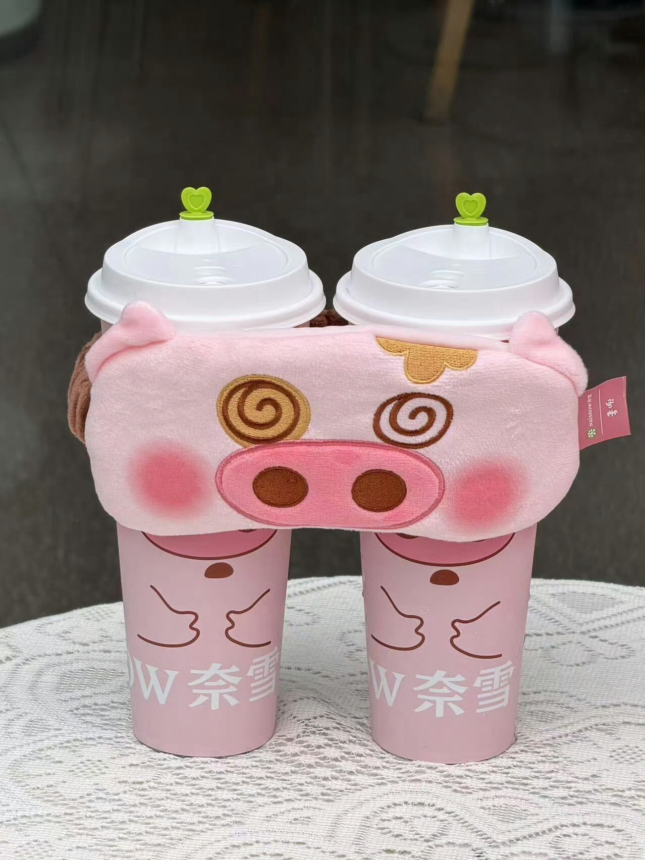 泡泡玛特告奈雪的茶获赔32万兜住所有小美好，奈雪麦兜联名，今夏治愈茶饮天花板。