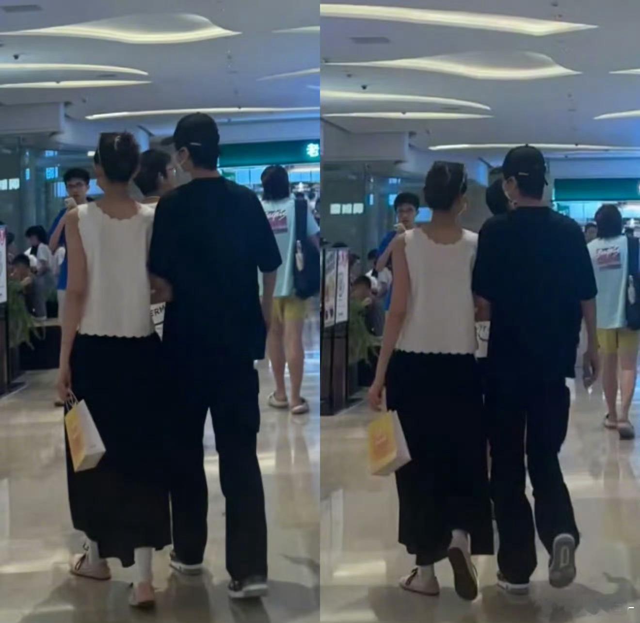 许嵩冯禧手拉手逛街两个人就那么紧紧贴着[期待][期待][期待] ​​​