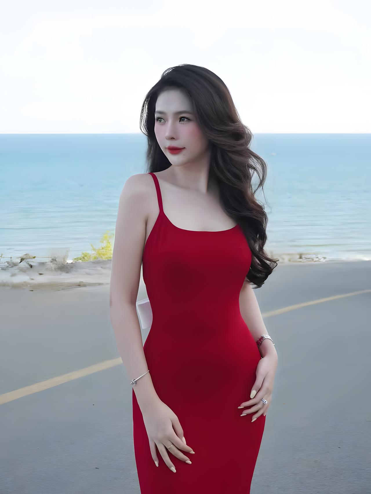 晒图笔记大赛美女优雅漫步在湖畔，红裙飘飘，享受海风美好时光。
