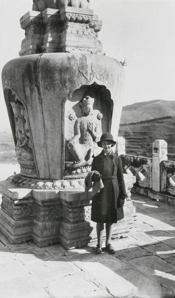 Margaret Lampson by a marble stupa, Temp