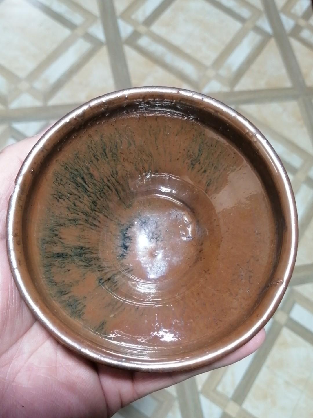 660元包邮
复烧，福清窑宋盏老胎复烧，全品，束口，口径11厘米，高5厘米。柿红