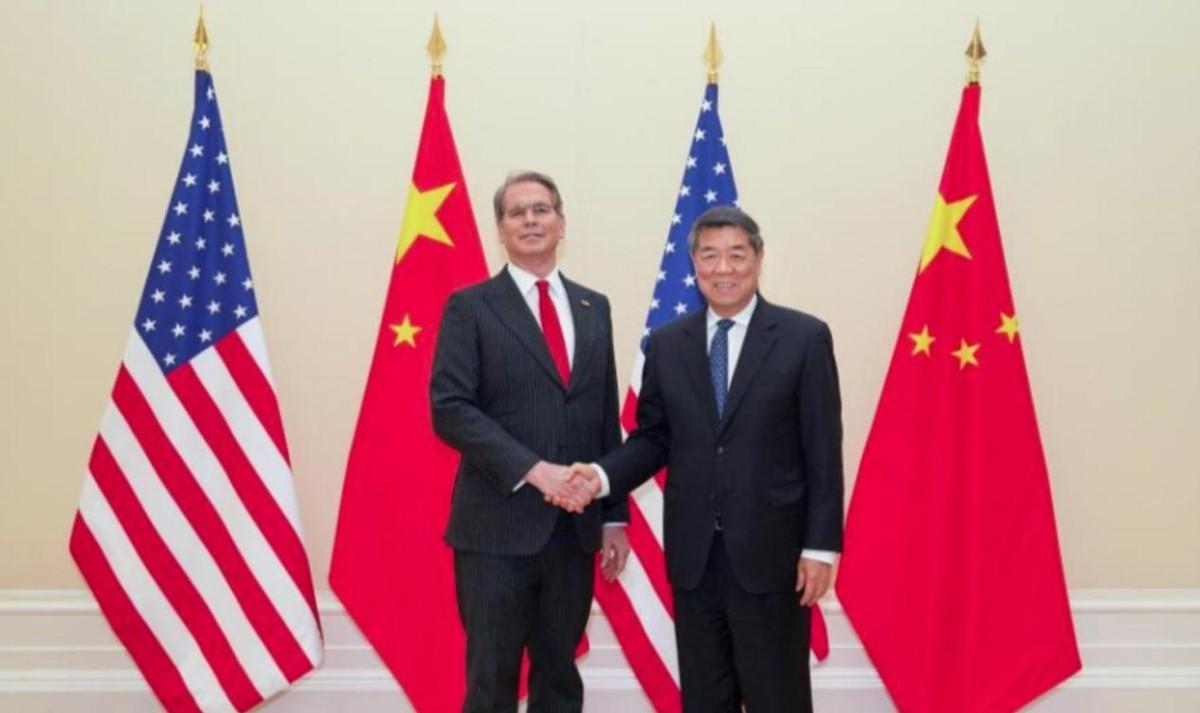 美：老弟，字签了再走啊，那关税和301调查的文件你还没领呢。
中：啥调查？没听说