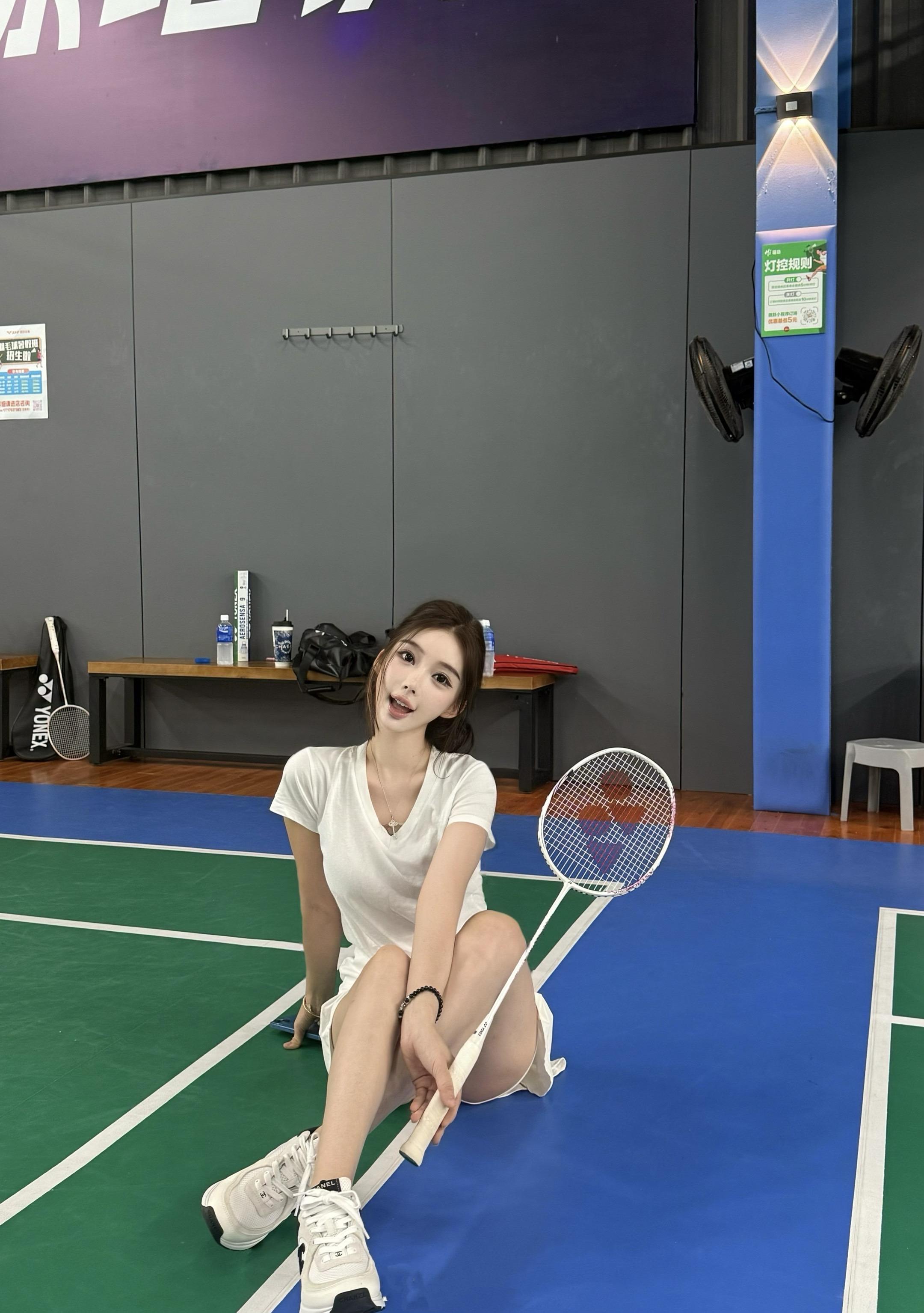 🏸