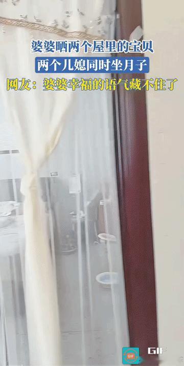 婆婆一边拍视频一边说:“这个是我二十三的大孙女，这个是我八天的大孙子。”“这是我