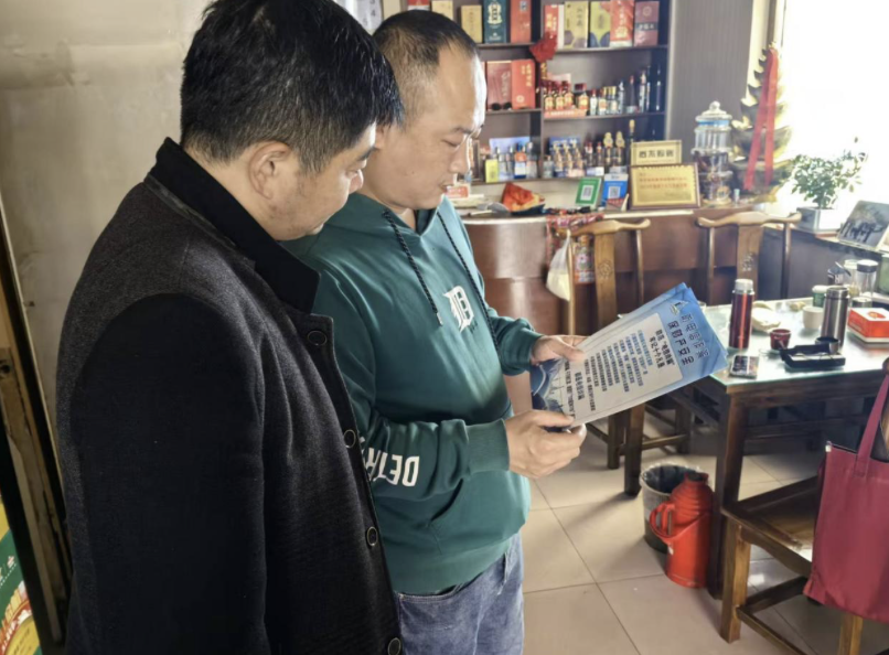 仙营社区开展“反电信诈骗宣传进商铺”志愿服务活动