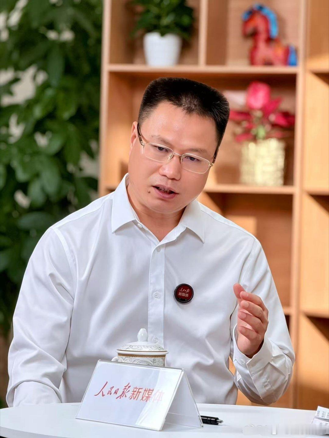 时代浪潮下的新能源实业坚守 人民日报专访欣旺达王明旺总，解码新能源实业的成长力量