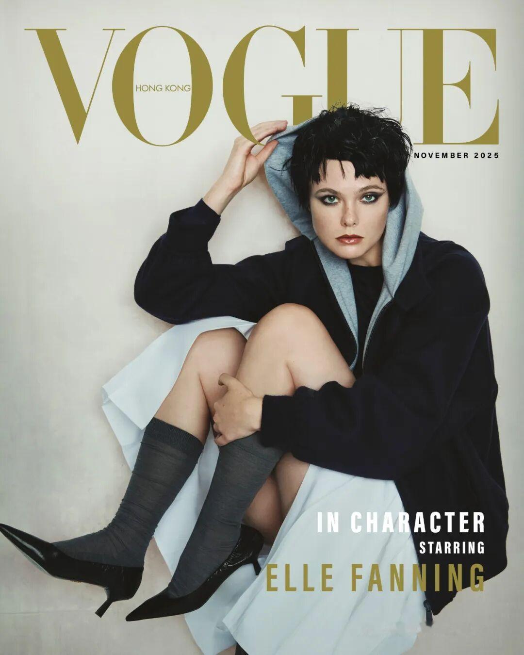 Elle Fanning 颠覆造型登上香港版《VOGUE》封面。
黑色的假发，看