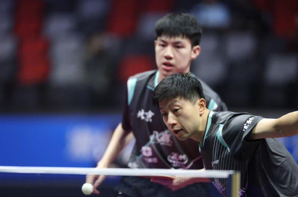 第十五届全运会乒乓球男团小组赛，北京队3-0战胜江苏，取得三连胜，以小组头名晋级