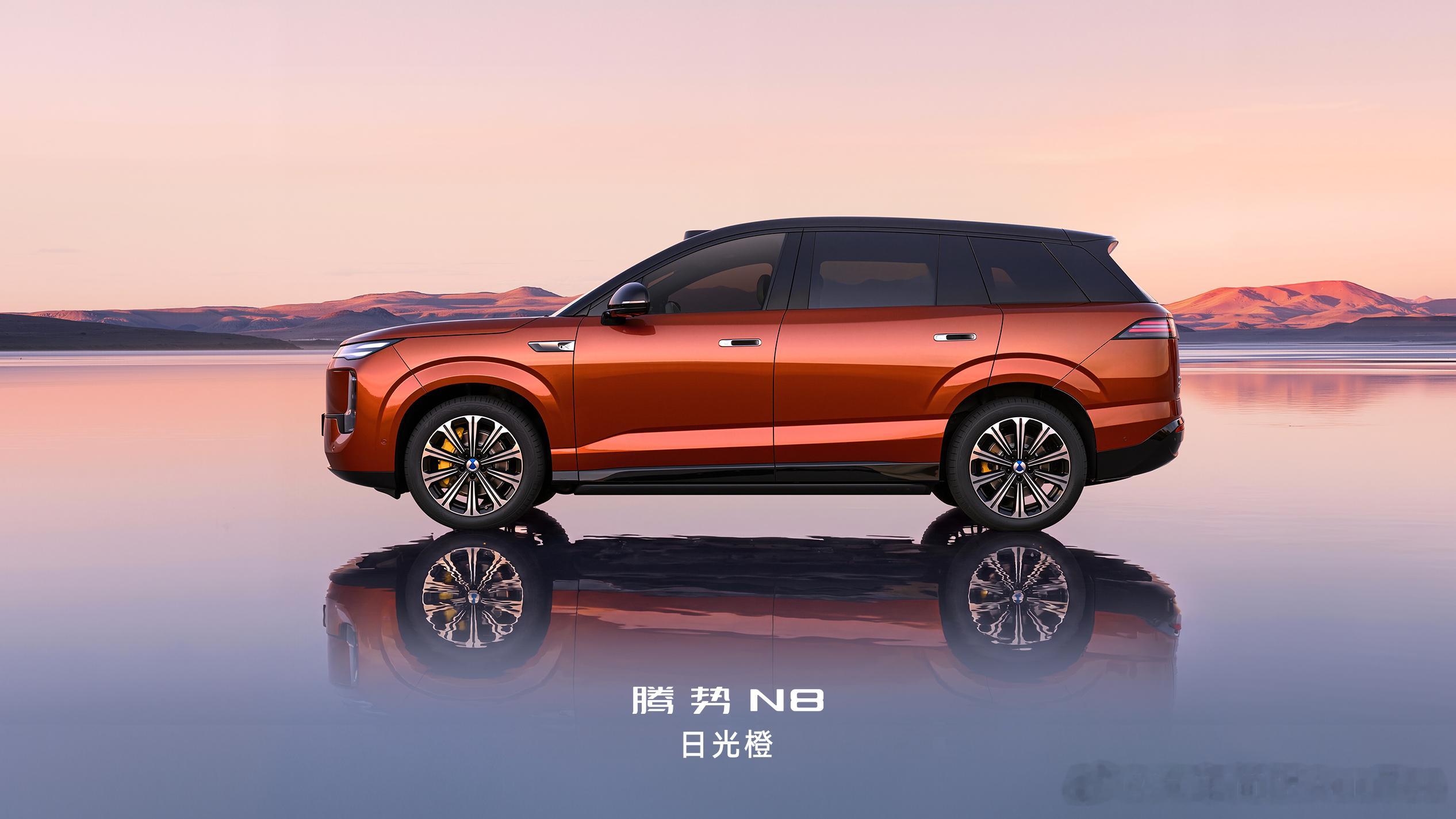 腾势N8全新车色「日光橙」灵感源自天然宝石日光石阳光下明艳炽热，尽显鲜活张力阴影