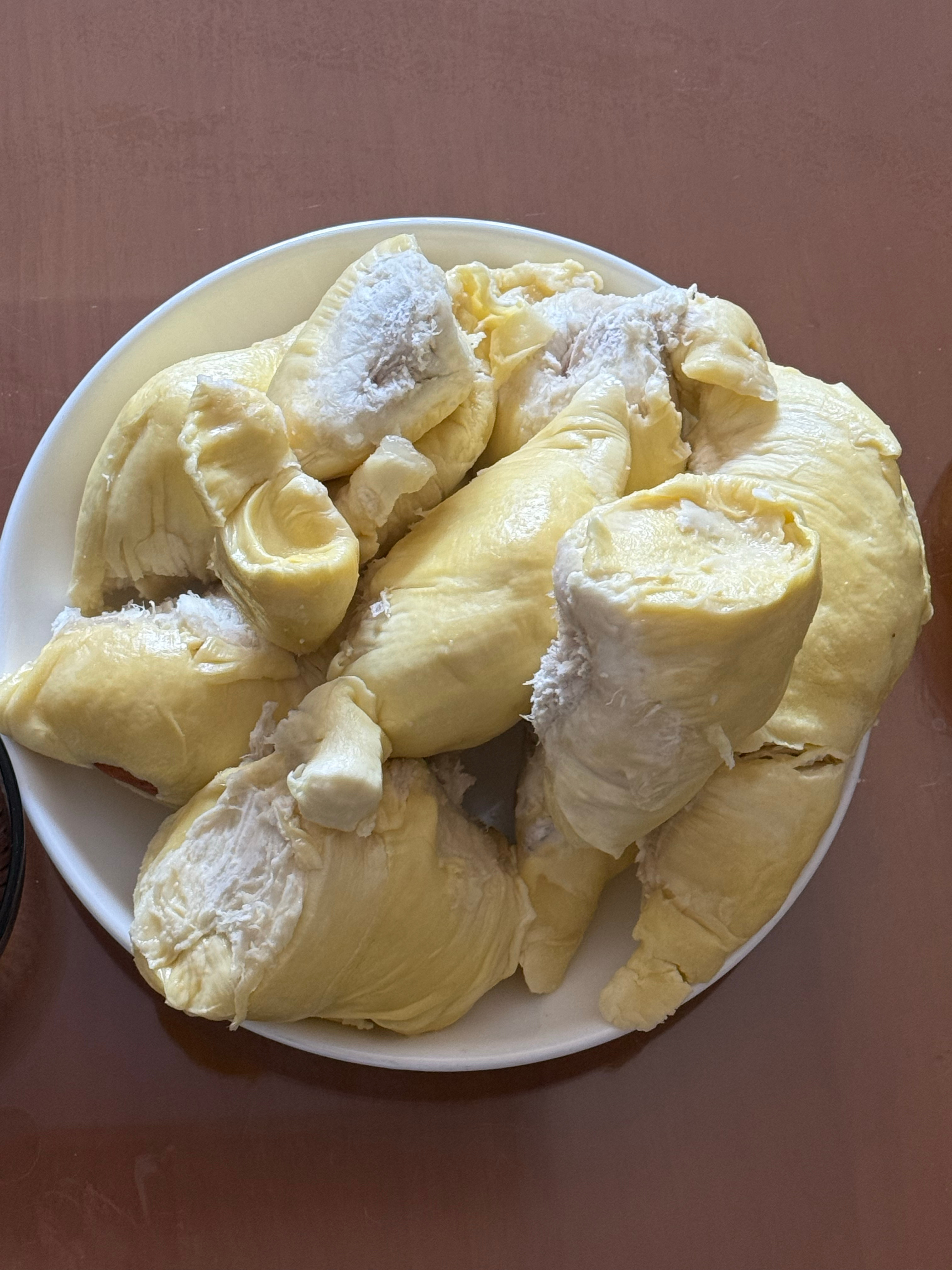 现在买榴莲是真便宜啊，刚才看超市才21.9一斤，那必须是直接拿下啊！这么便宜不买