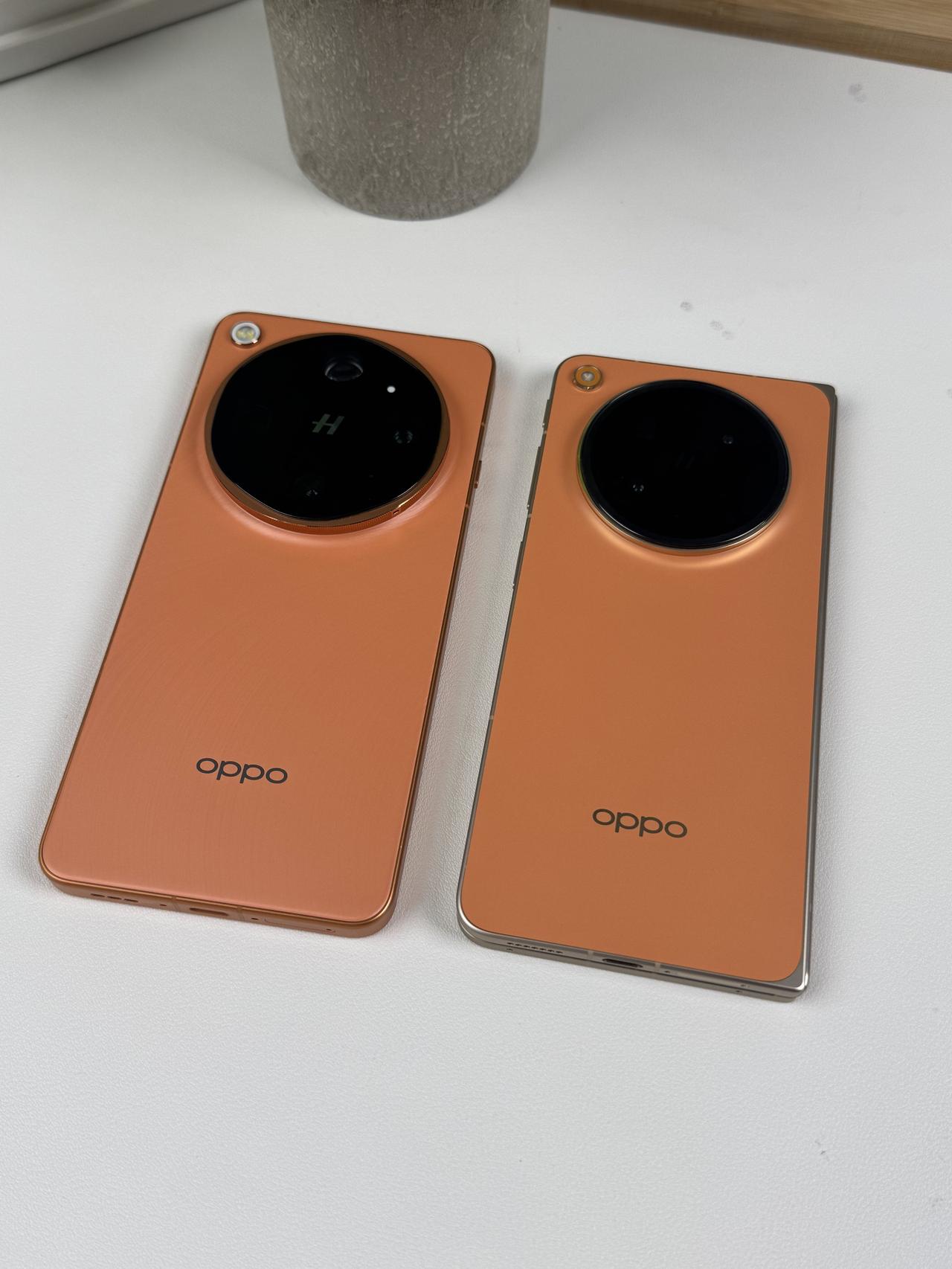 OPPO 今年做橙色手机上瘾了
不过虽说都是橙色，但还是有点小区别，find n