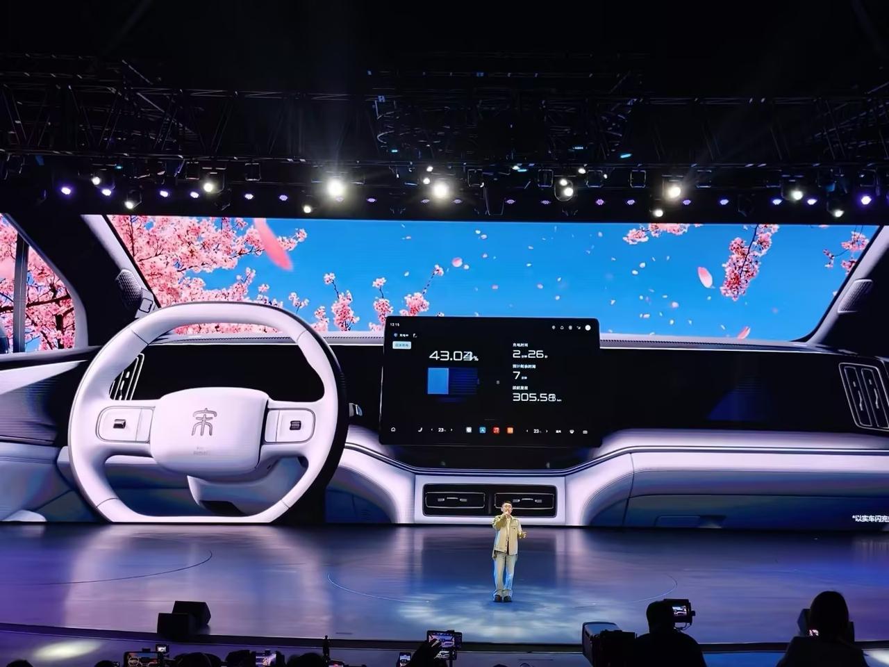 金志文上台献艺！但是他的嗓子并不是最大的亮点，你看一下后面大屏幕的充电进度，这才