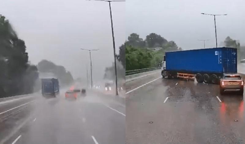 黄色暴雨，今日（15日）下午2时许，一辆轻型货车及一辆重型拖头货柜于屯门公路近小