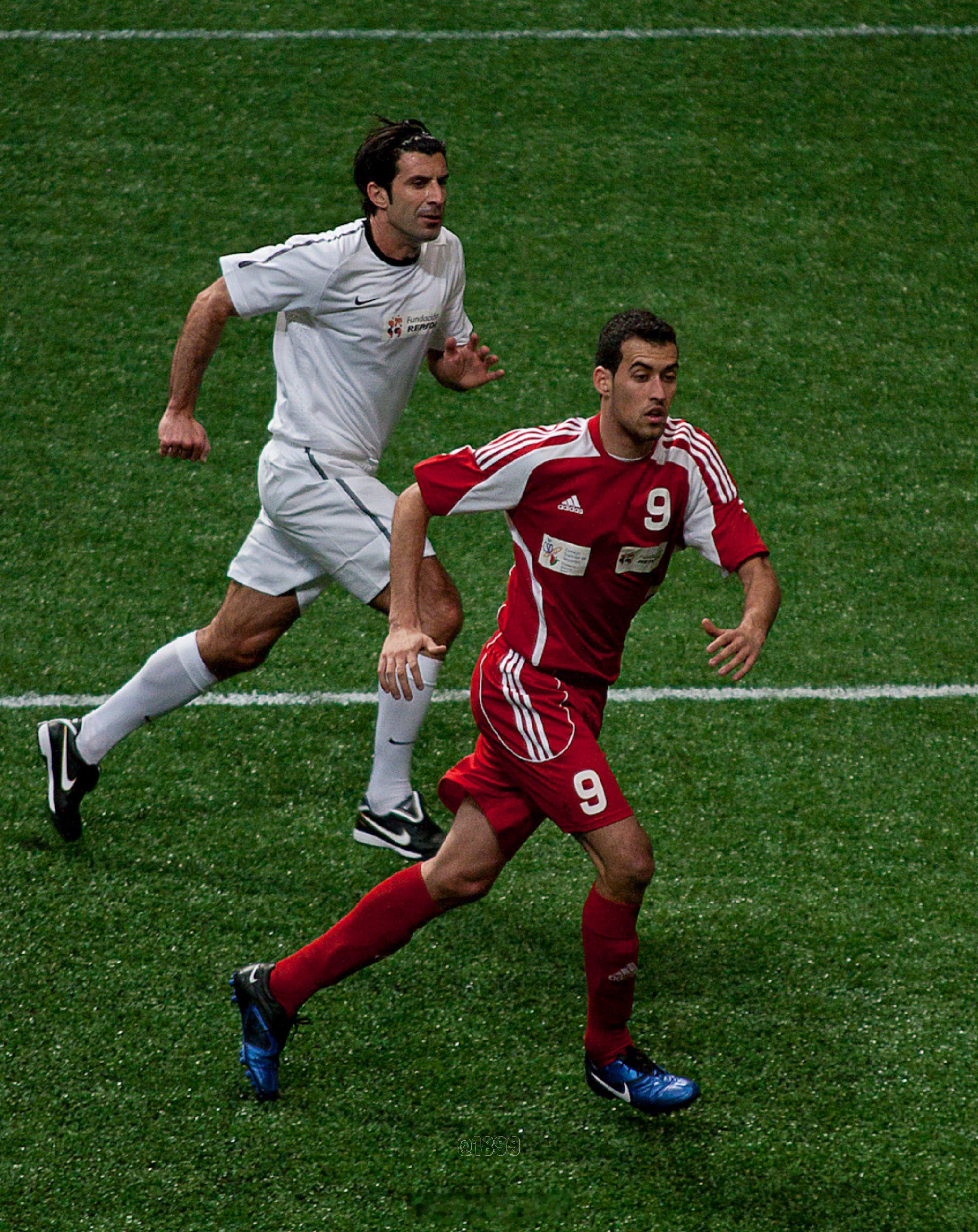 Sergio Busquets & Luis Figo. Charity mat