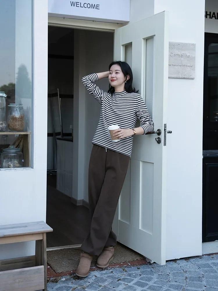 当你穿过半高领打底衫后
你就不会再想穿高领打底衫了
因为半高领打底衫不但时髦还保