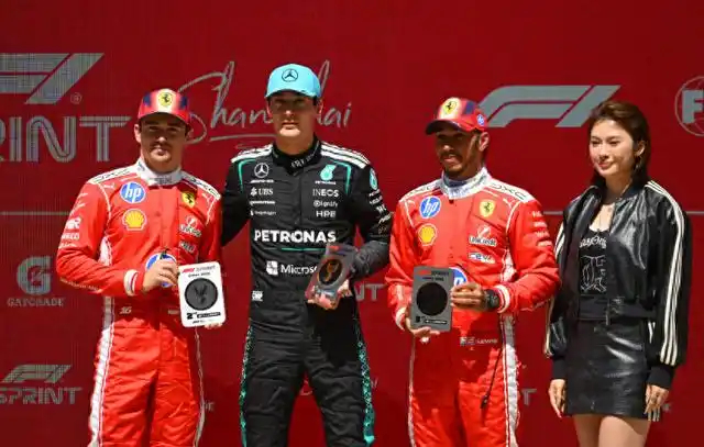 F1官方把吴艳妮合影照片给截掉了，什么水平？ 