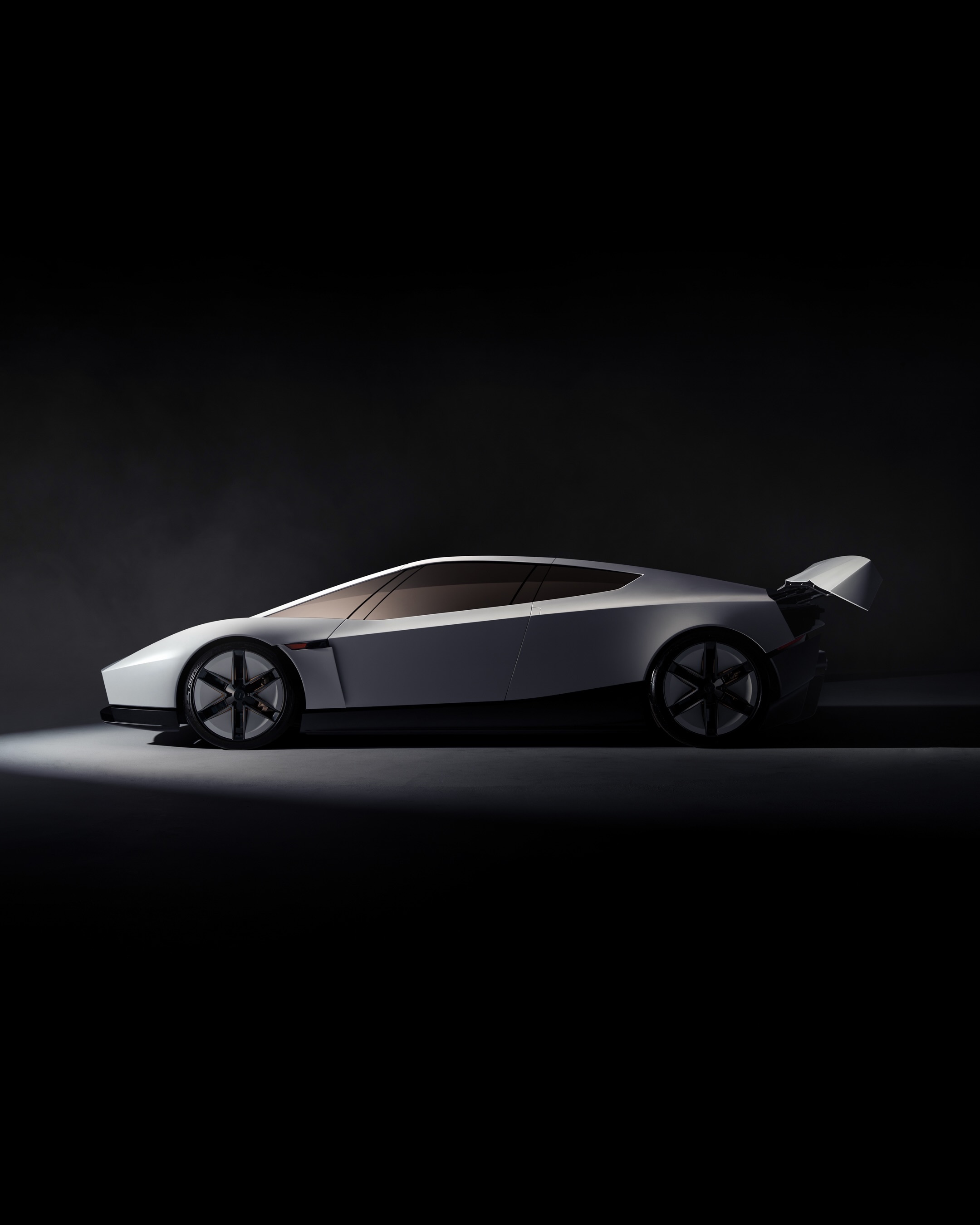特斯拉 Roadster 这个外观设计有点科幻版兰博基尼的感觉，棱角凌厉的线条、