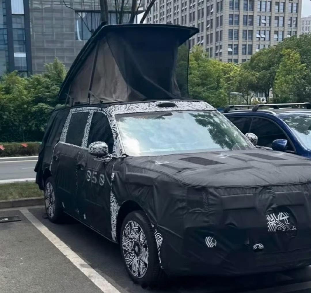 小米“寻天”SUV 原型车再曝光，自带车顶帐篷。小米汽车308_IO新能源汽车