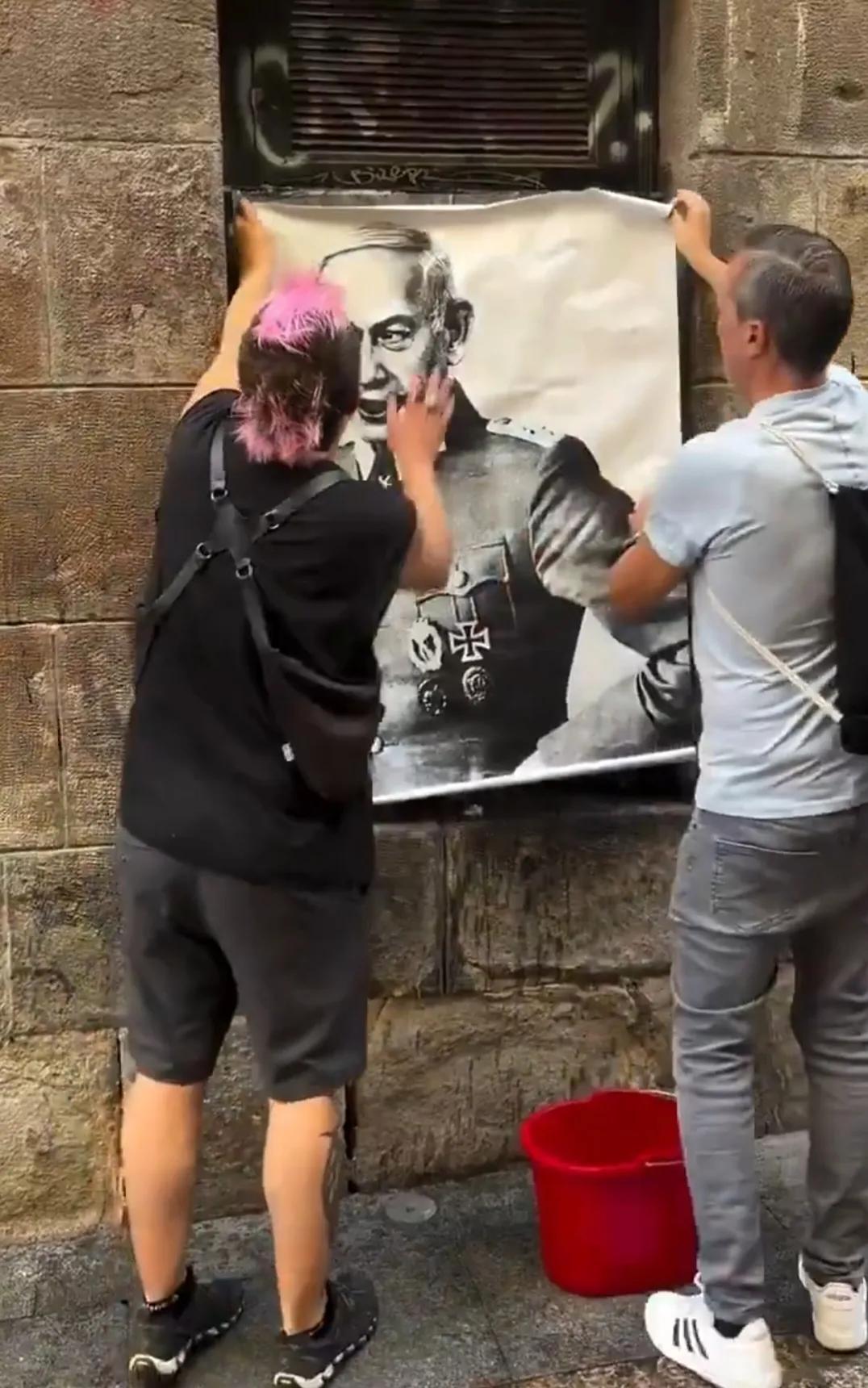 西班牙对以色列的厌恶不光来自高层，主要来自大众。看看，西班牙老百姓将以色列总理内