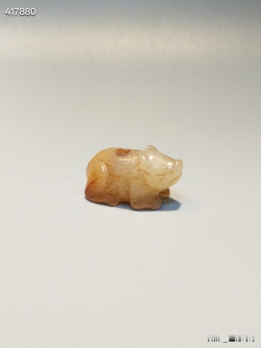 玉猪
流行于:战汉魏晋或后期
和田玉吃沁