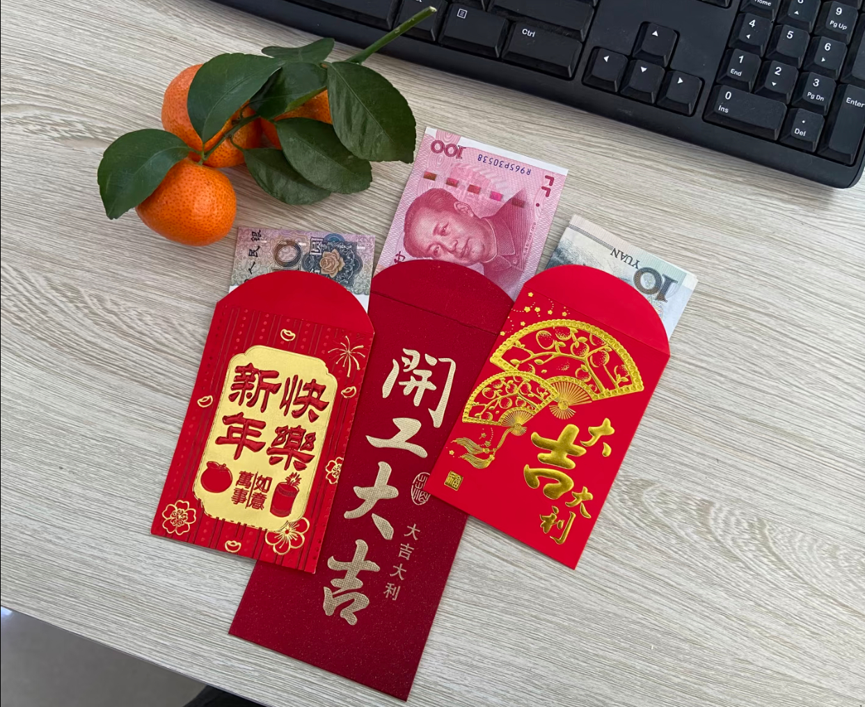 新年开工第一照春节摄影大赛 一抹中国红，几颗大吉桔，一架待战的键盘。开工首日，吉