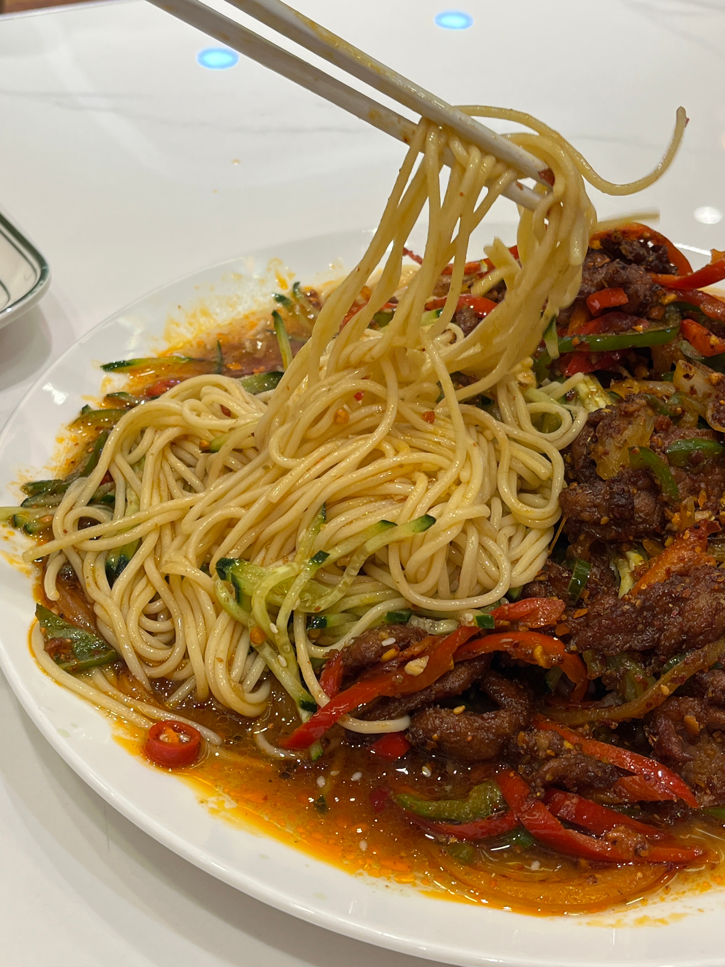 上周和高中同学吃的麦蒂尼朋友说吃过这家好多次，味道挺不错的黄面🍝这是凉面，挺大