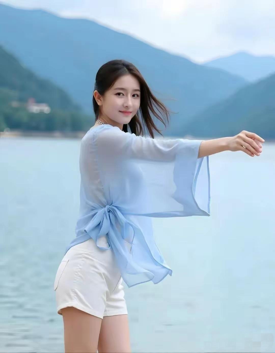 夏日湖畔轻纱飘逸，少女漫步山水间