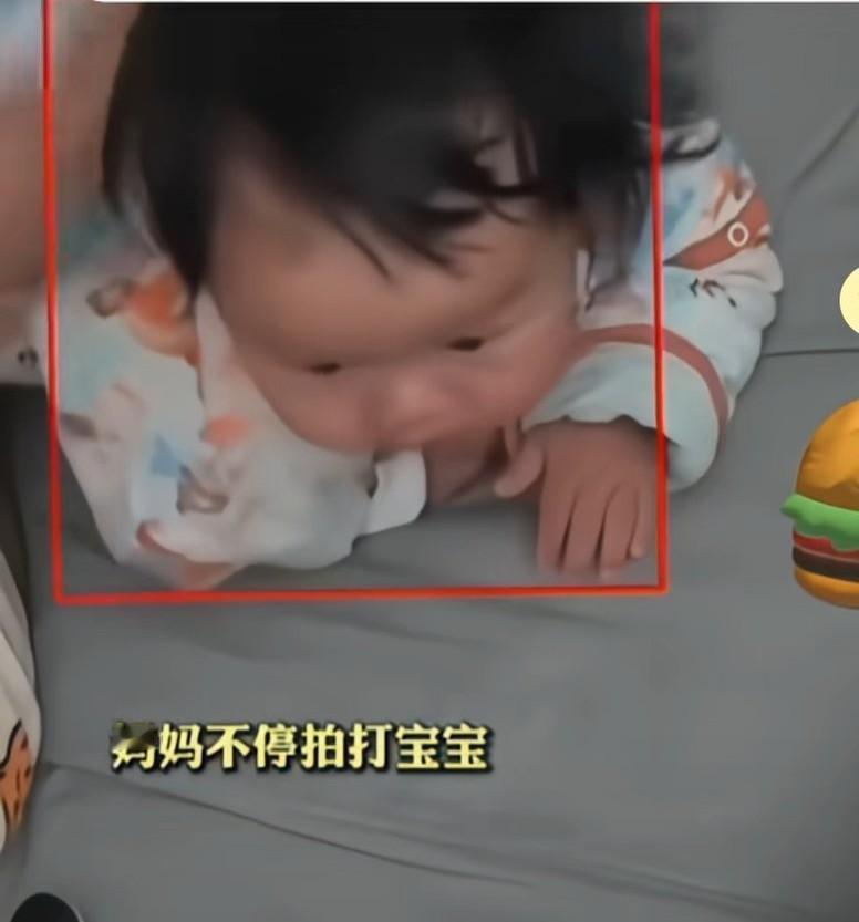 妈妈以为九个月孩子吐奶，于是给他拍背，
拍打背部后竟吐出一枚图钉。天呀，这孩子到