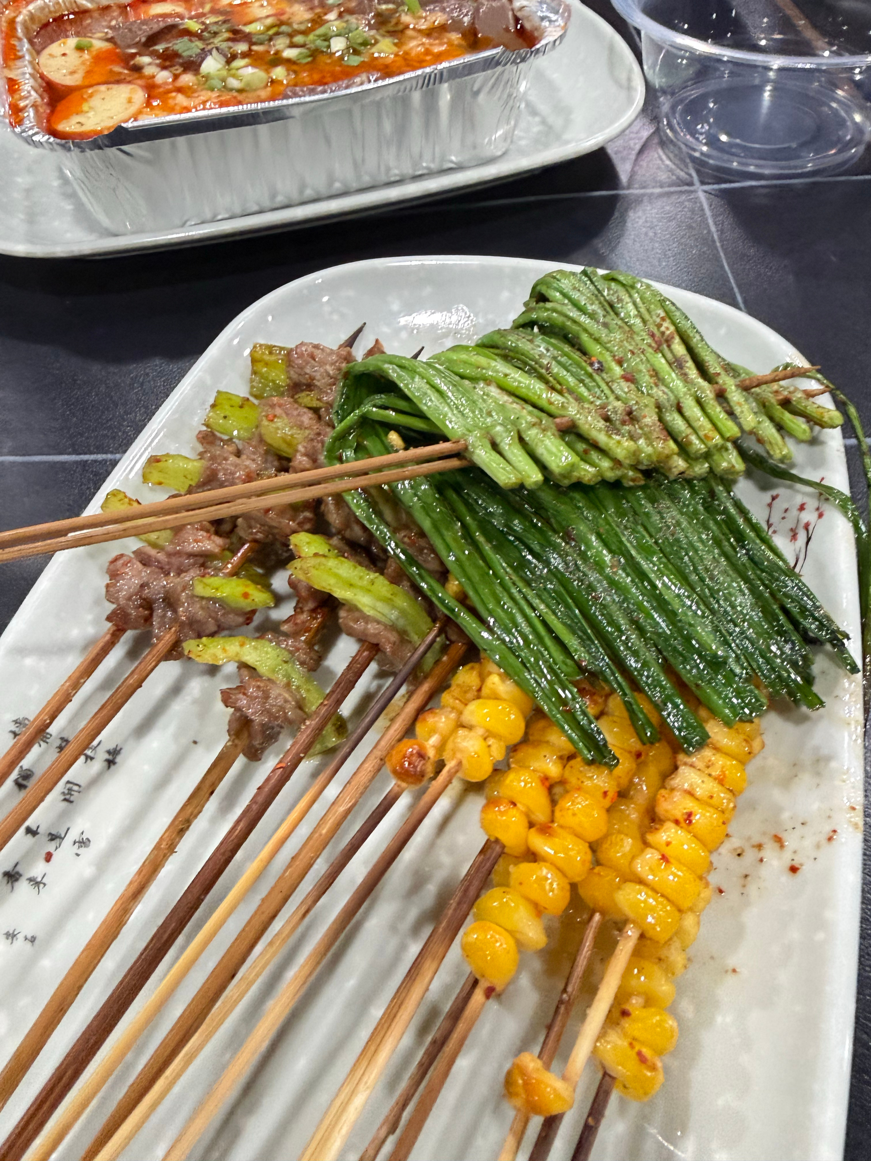 你们那边烤玉米是这样一粒一粒串起来的吗？
