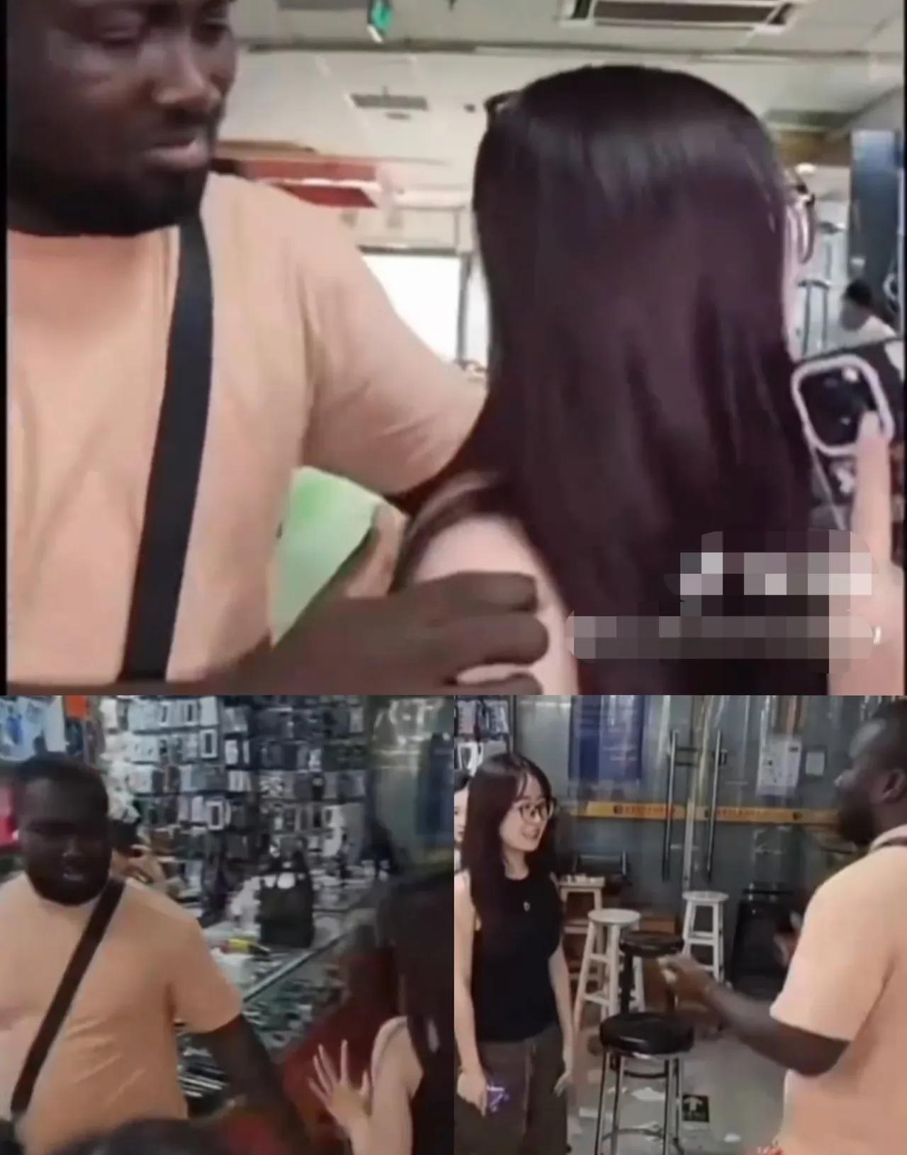 一名黑人男子上前搭讪店内女生，整个人不停往女生身前凑。女生察觉到不适往后退，对方