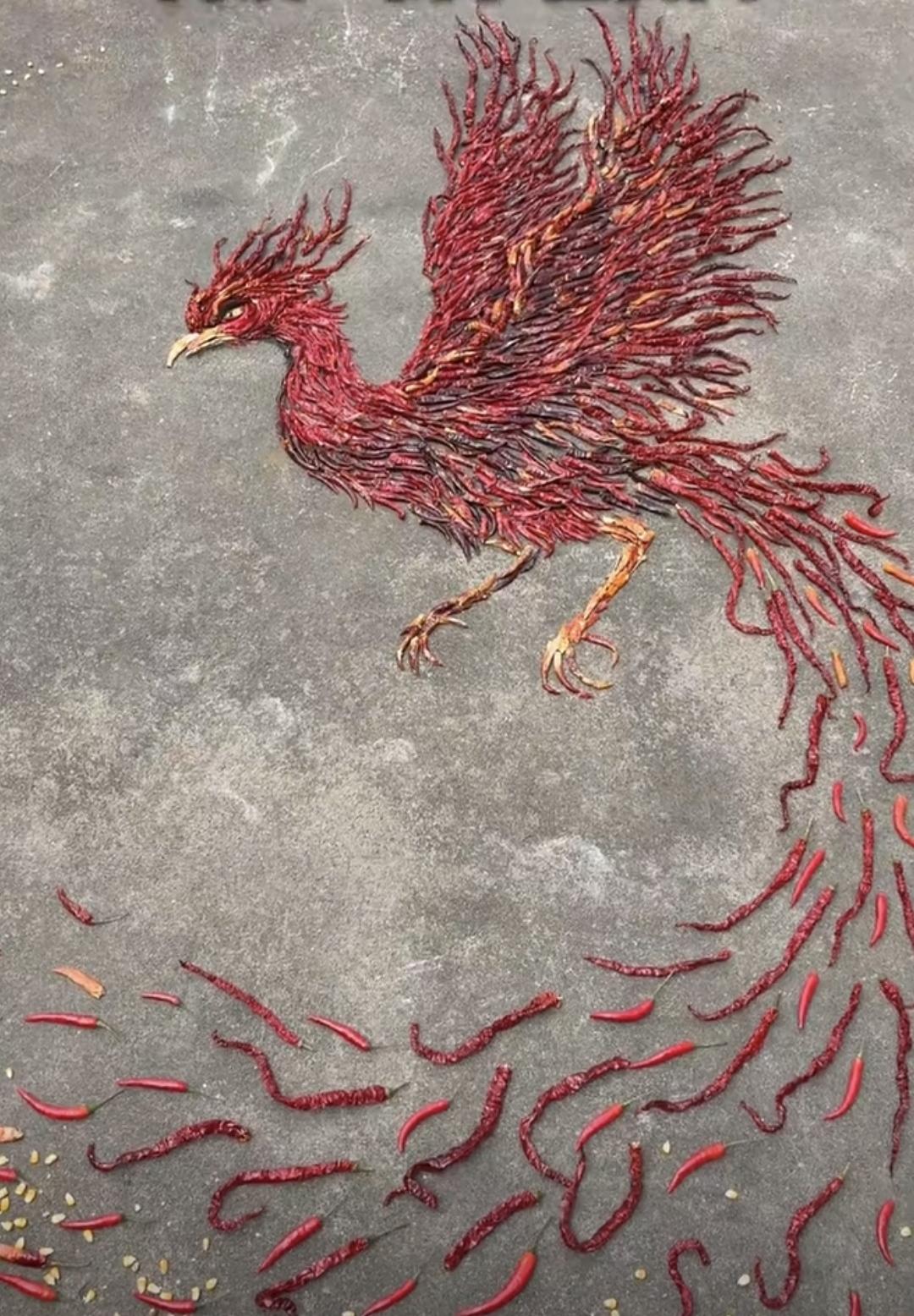 分享你今日的感悟高手在民间——农民用辣椒摆得凤凰！