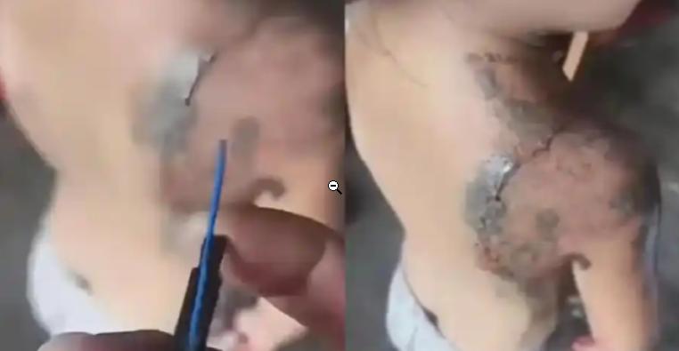 广西，一个小女孩正在澡盆里洗澡，12 岁的哥哥想要跟她闹着玩，拿着一个类似电机的