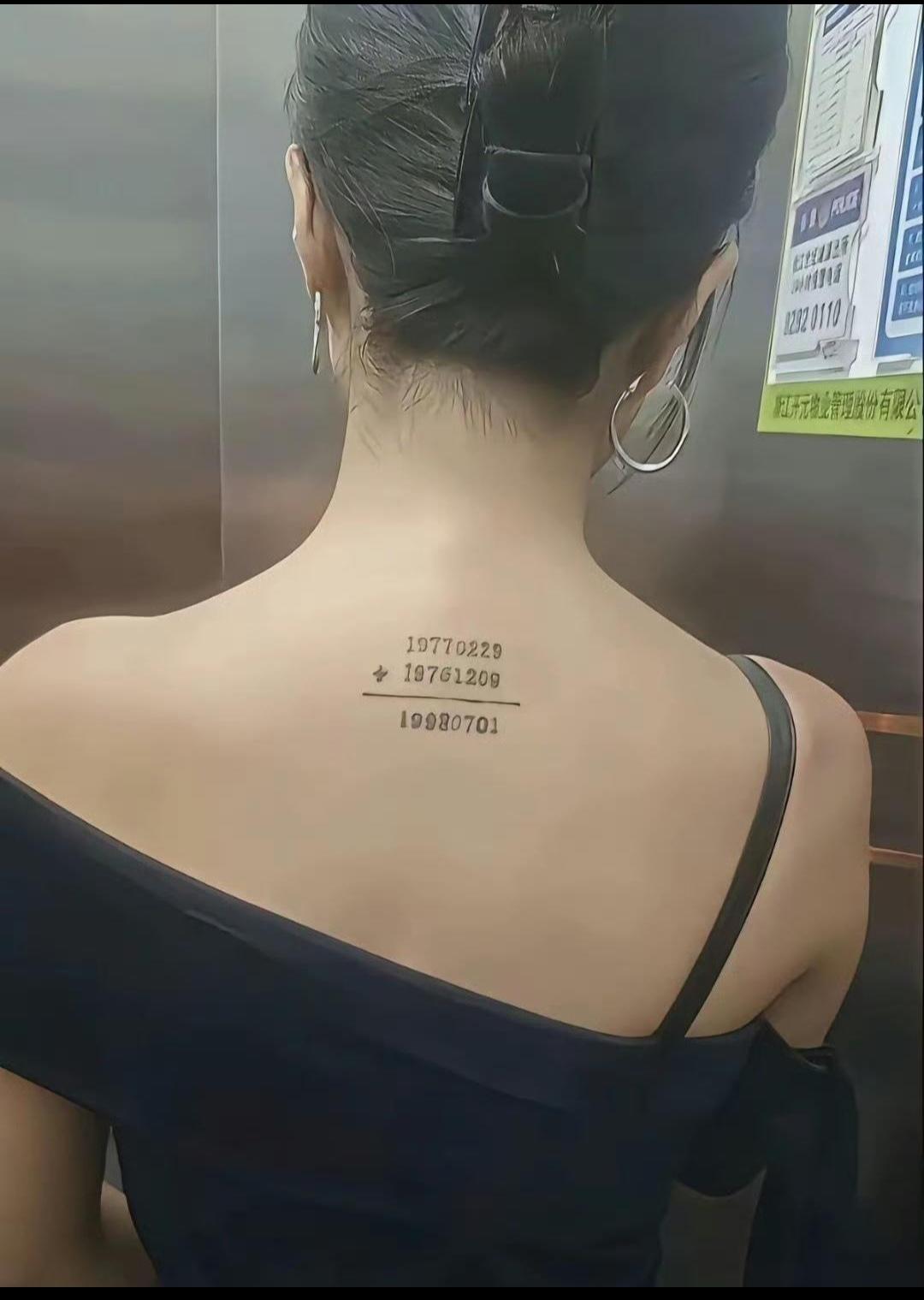 早晨坐电梯看到的，女邻居后背这个纹身到底什么意思啊？